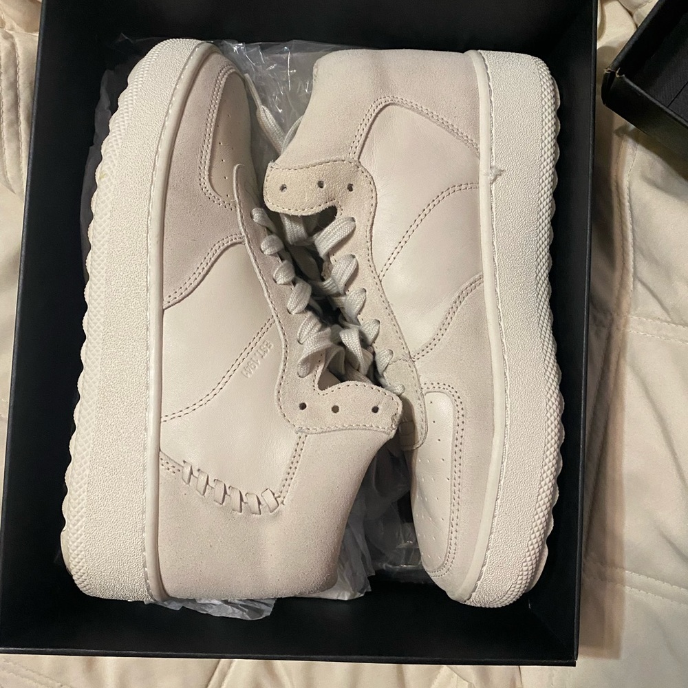 Free sneakers from work got wrong size selling them brand new
